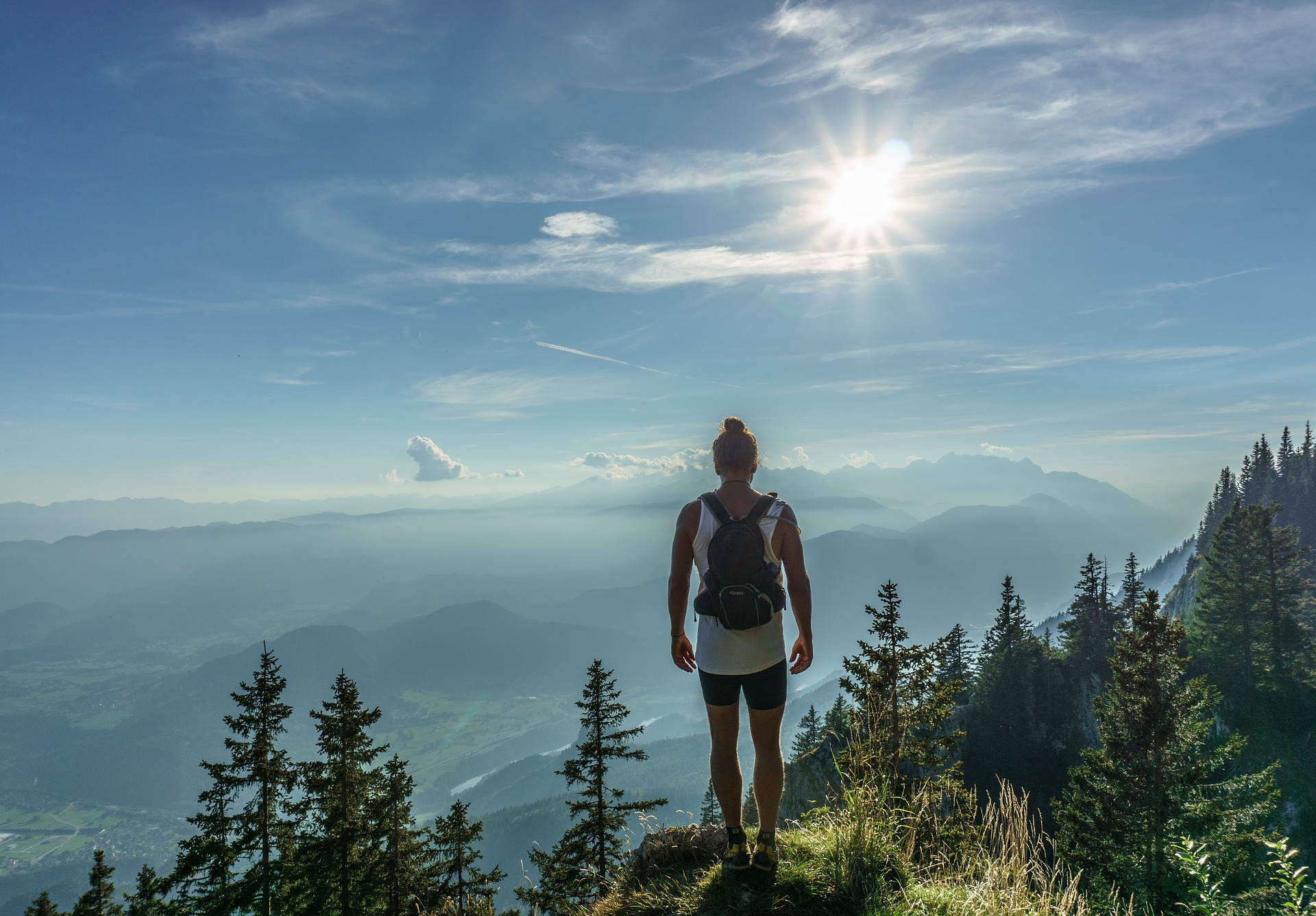 Traveler overlooking a mountain landscape